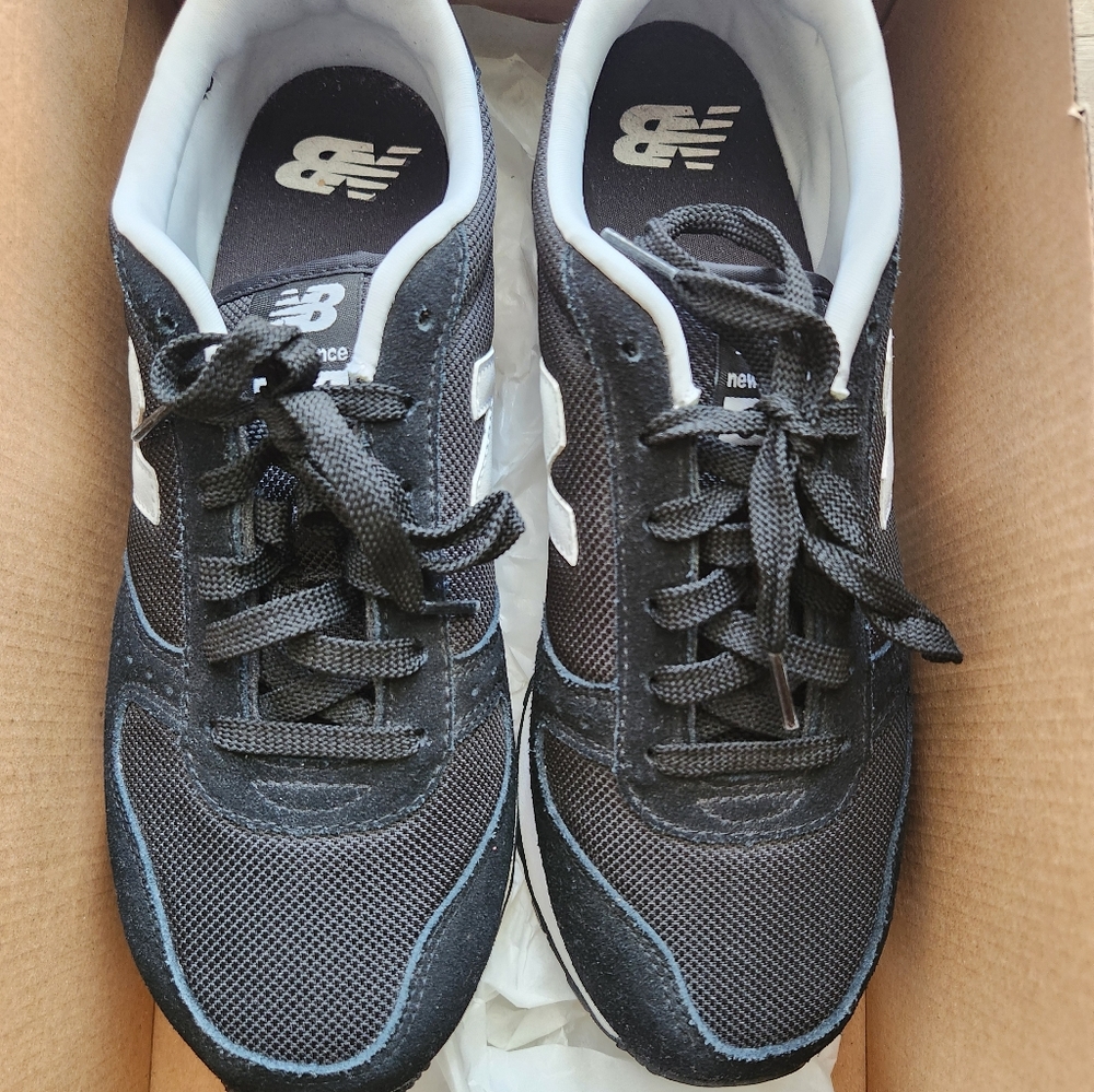 Nike 311 New Balance Sneakers